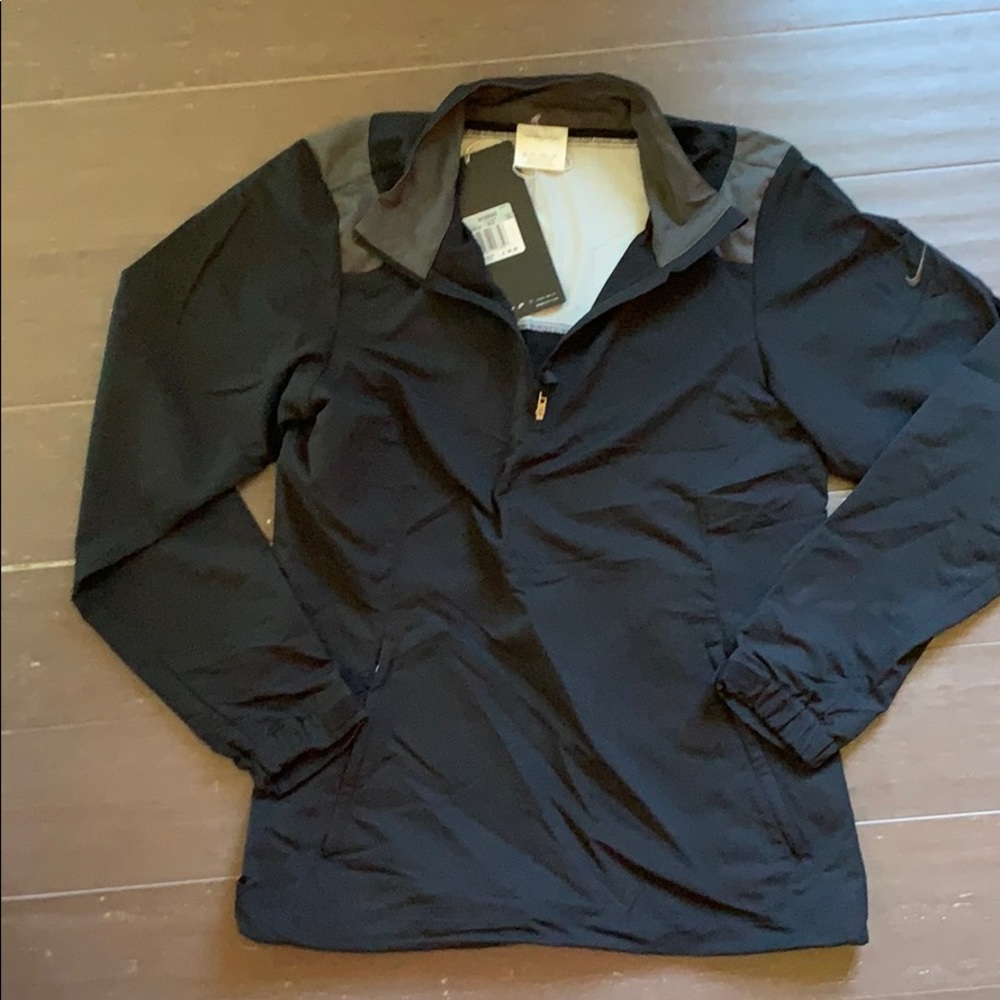 Nike golf stretch windwear jacket XS.   Jacket is new but does not have tags.
